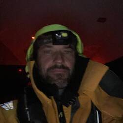 Me sitting at the inside helm station. No heat and ready to go.