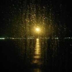 Moon rise over Ajaccio through our porthole