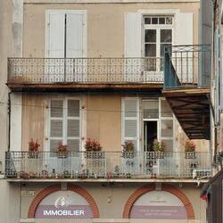 More traditional windows, always with shutters