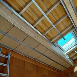 The roof insulation in going in slowly