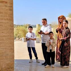 The family came to pray at the mausoleum of Mohammeds companions - distracted by our group