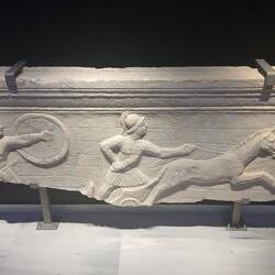 Sarcophagus fragment showing Achilles dragging the body of Hector around Troy