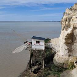 The carrelet cabin with the unique square fishing net that is lowered into the water at high tide