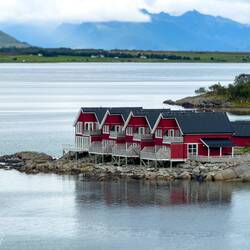 I love these coastal cottages that add color and charm.