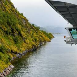 Nearing the mouth of Trollfjord on our way out.