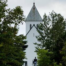 Hedda and the Svolvær Church, which was painted in camo colors during WWII.