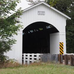 Mosby Covered Bridge has a rails to trails open railroad bridge about a hundred feet tor the left
