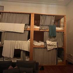 Triple decker bunks. Mine is the top right (green towel)