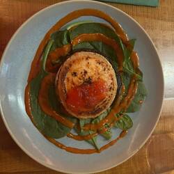 Portobello mushroom with grilled goats cheese and a mango and curry sauce