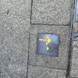 A sign pointing back the way I'd come, for the wrong Caminho Português