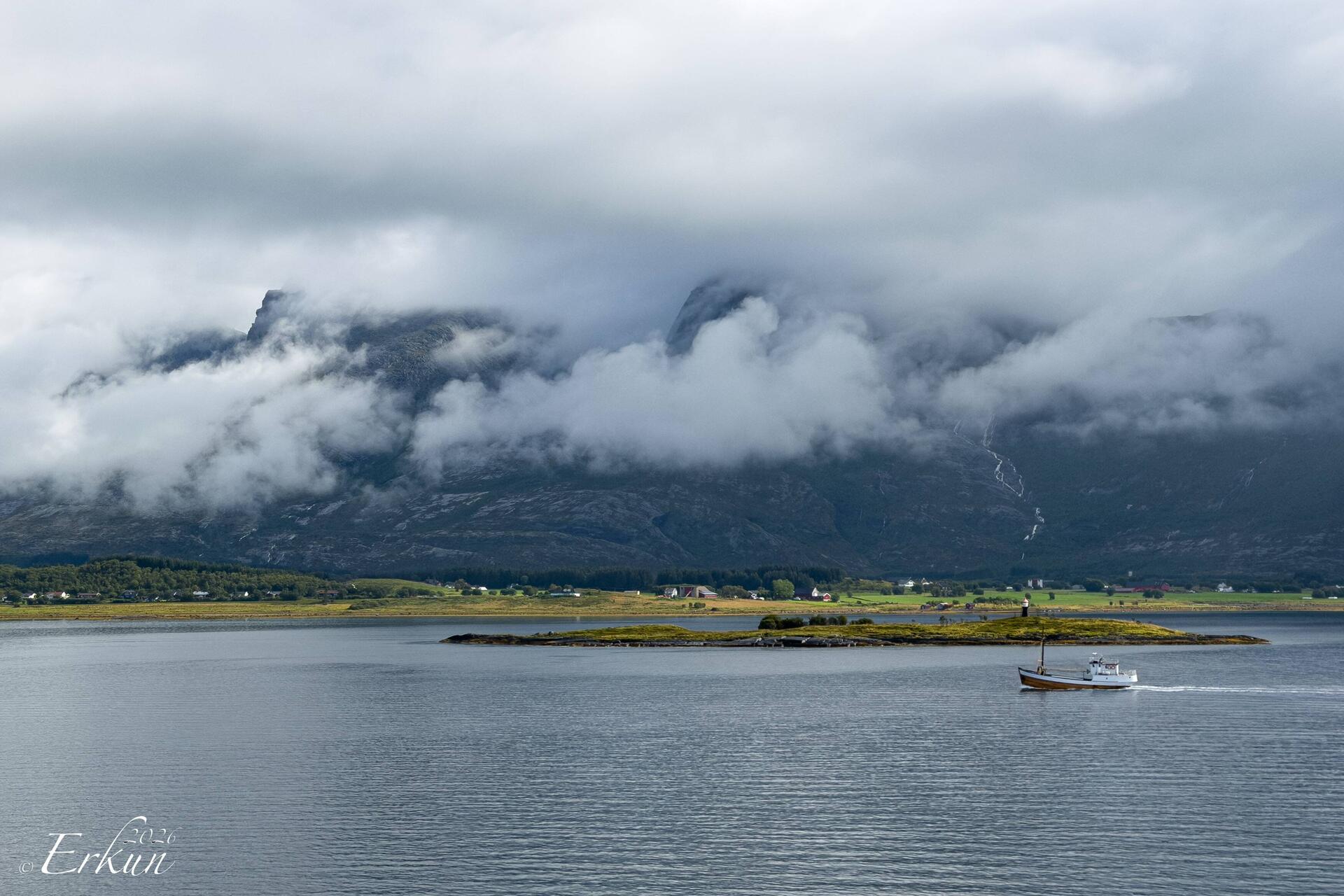 The Seven Sisters Mountain Range hide themselves behind clouds.