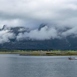 The Seven Sisters Mountain Range hide themselves behind clouds.