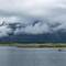The Seven Sisters Mountain Range hide themselves behind clouds.