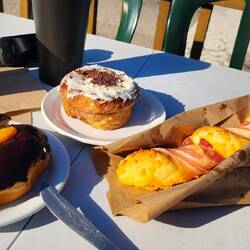 Orange cream donut, cinnamon bun and bacon cheese twist.