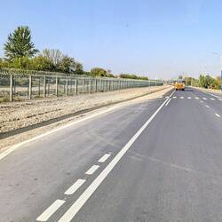 Driving along the barbed wire fence between Tajikistan and Kyrgyzstan