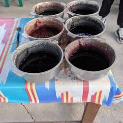 Different colours mixed with vinegar to fix the dye