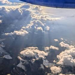 Flying over snow covered mountains