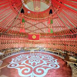 Dinner in communal yurt with traditional seating