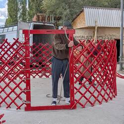 The master yurt builder putting together the frame