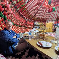 Breakfast in a yurt sitting on the floor