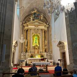 Inside the Igrexa da Virxe Peregrina, with the central image, the Virgin Mary dressed as a pilgrim