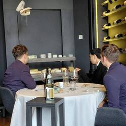 The young lads perusing the cheeses