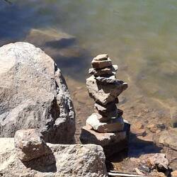 A Cairns near the dam