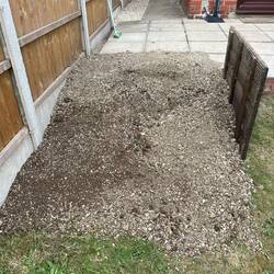 Completed ramp held in place by old coal bunker lid.