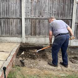 Digging up dirt for temporary ramp.