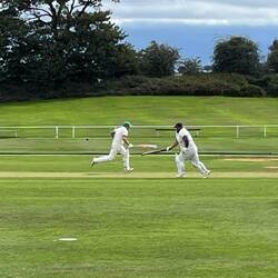 After hitting the ball the two batters run to opposite ends of the pitch as many times as they can.