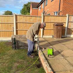 Using Hammer Drill to Put in Reinforcements