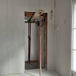 The opening is propped, waiting for the lintel