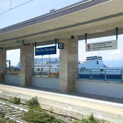 Pulling into Villa San Giovanni, we catch a glimpse of the train ferry waiting for us.