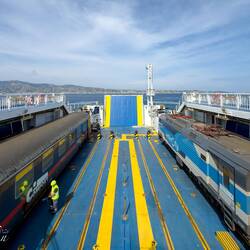 Looking down on the train deck from the outside passenger deck.