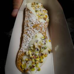 Mui's end-of-the-day treat ... cannolo filled with ricotta cream — Cefalù, Sicily.