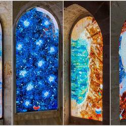 Some of the modern stained glass windows in the nave ... from the crosswalk — Duomo di Cefalù.