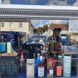 Window of the Whiskey shop - dogs welcome as long as they don't drink too much