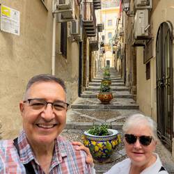 Vicolo Caracciolo is known for the colorful ceramic pots that run down its middle.