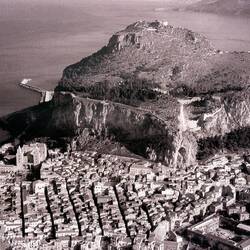 The Rocca di Cefalù and the city below it; cathedral to the left — Osterio Magno.