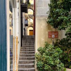 Alley branching off from Piazza G. Battista Spinola — Cefalù, Sicily.