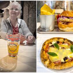 Cold beer, pizza, and a burger for dinner in Ortigia — Siracusa, Sicily.