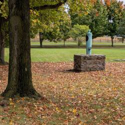 a mortuary cannon monument mounted muzzle-down on a stone base. One of 12 at Antietam ...