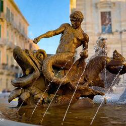 One of the tritons ... this is a teenager riding a seahorse — Fountain of Diana.