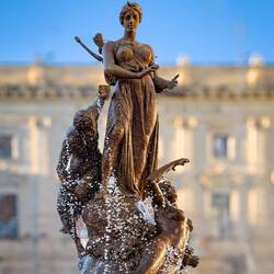 Diana just as she is about to transform Arethusa into a spring — Piazza Archimede, Ortigia.