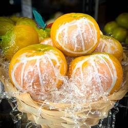 These tangerines look real ... but they are made of marzipan ... in a shop on Ortigia Island.