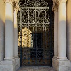 The main entrance has a beautiful wrought iron door — Duomo di Siracusa.