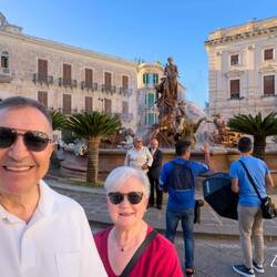 'Young-at-heart' bride and groom and their photographers photobomb our selfie — Fountain of Diana.
