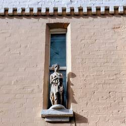 And then there was the 'maiden statue' on the window next door