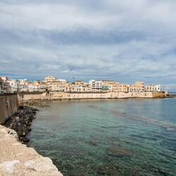 Crystal clear water along Lungomare Ortigia.
