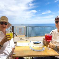 Limoncello & Campari spritz as pre-lunch aperitivi @ Colapesce on Lungomare Ortigia.